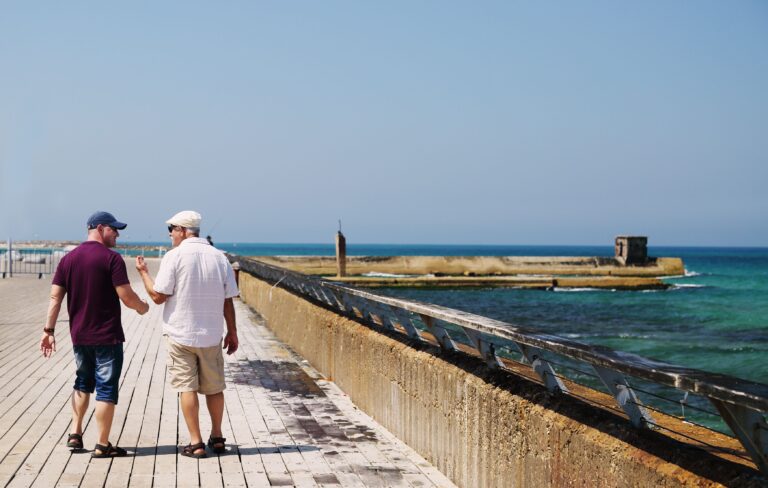 Father and son on the boardwalk in Tel Aviv
